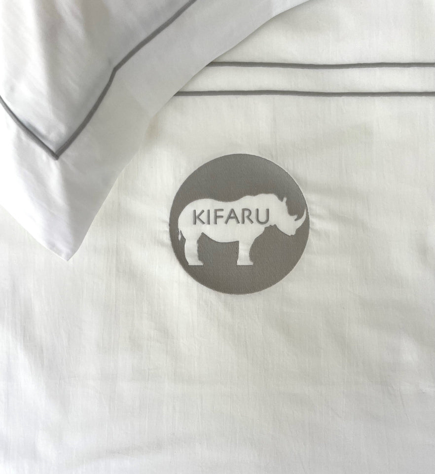 Geborduurd bedlinnen voor B&B - Kifaru