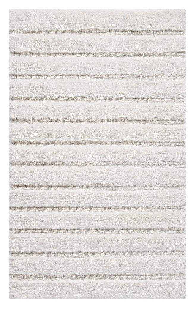 Ivoorkleurige katoenen badmat van Casilin met antislip laag en strepen motief