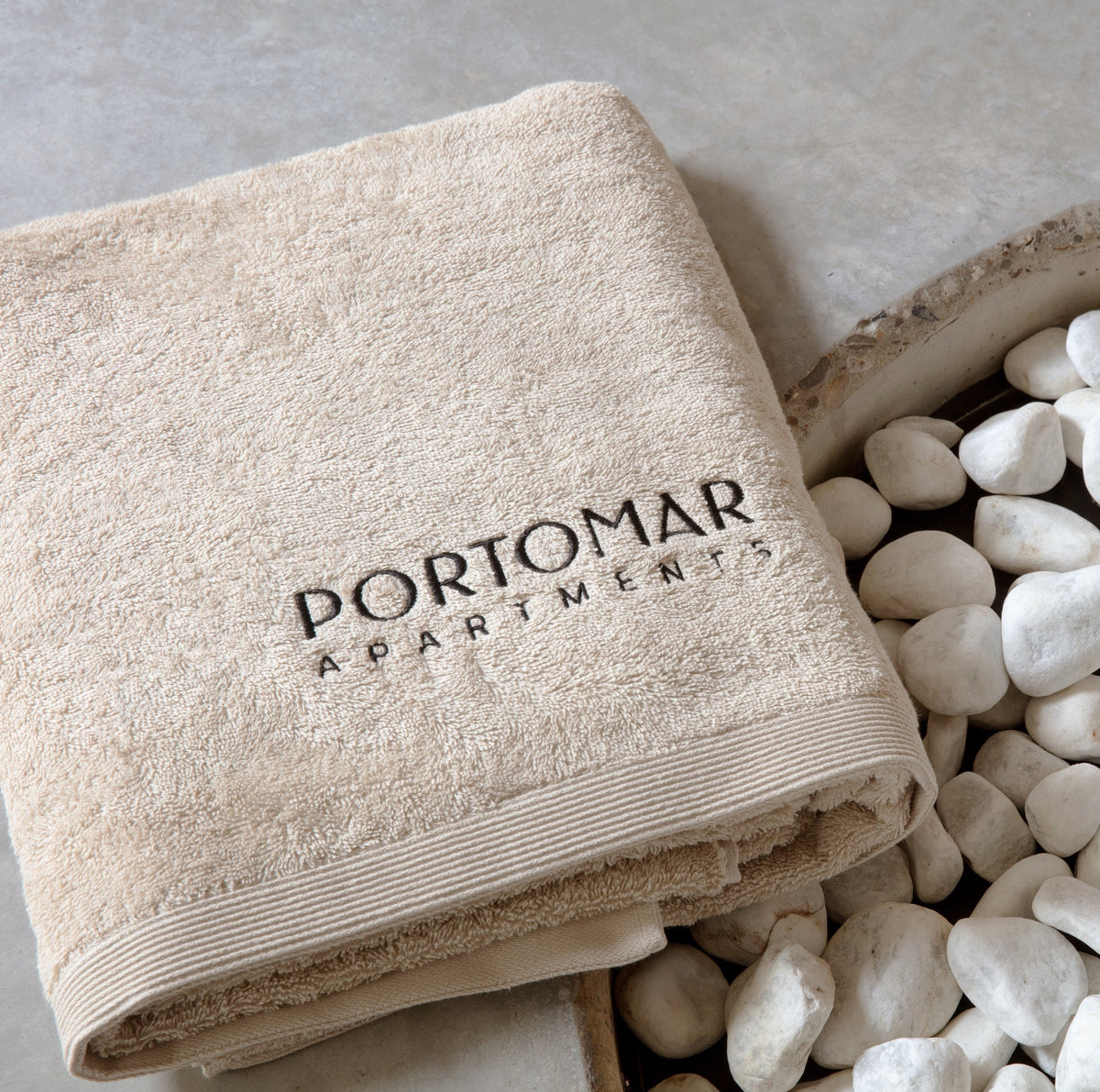 Gepersonaliseerde strandlakens voor Portomar Apartments